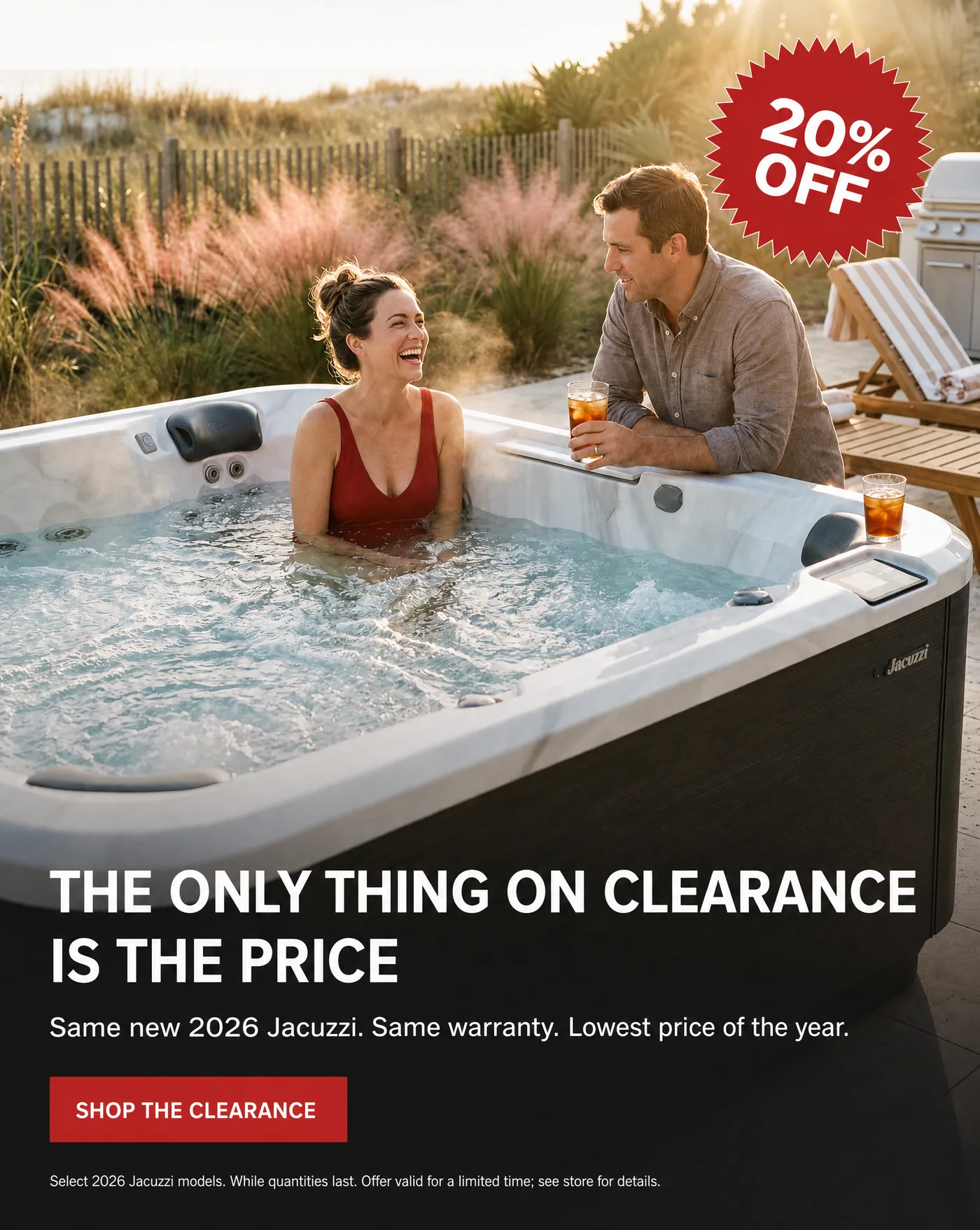 Couple relaxing in a new Jacuzzi hot tub with a 20% off Red Tag